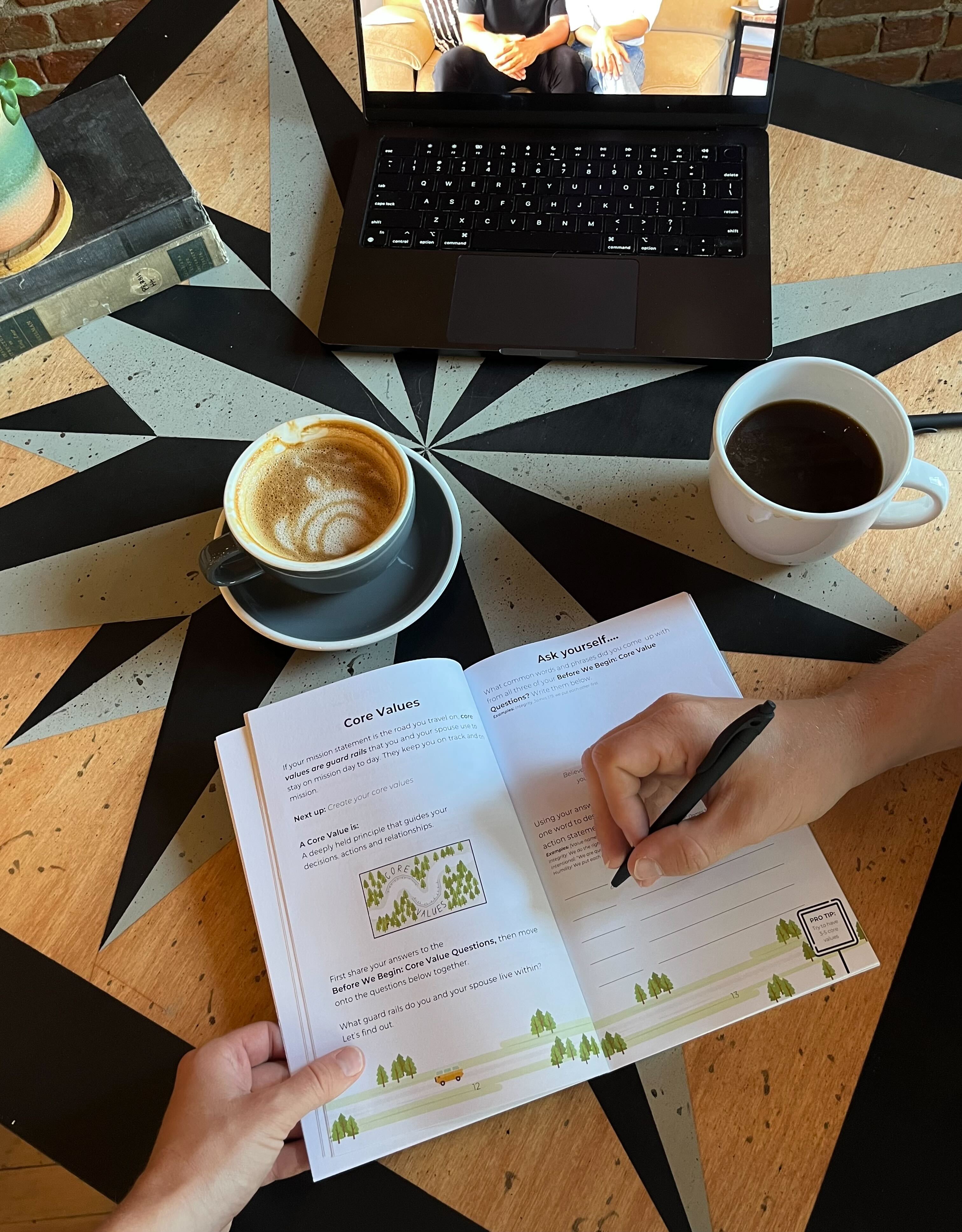 A couple taking the SimpliYoked course with the workbook